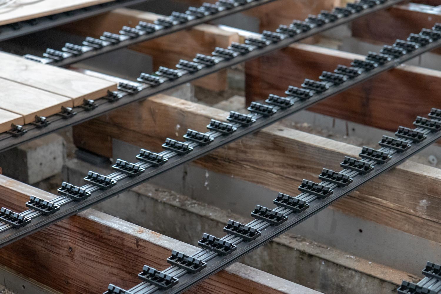 Decking being installed with pre-fitted rails